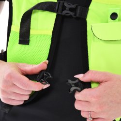 l�bevest i neon gul med flip-down mobillomme og frontopbevaring.